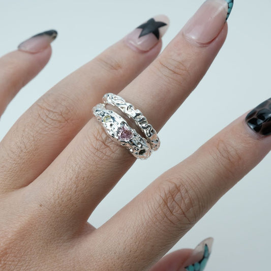 Aurora Bloom Ring worn on hand, organic silver texture with gemstones