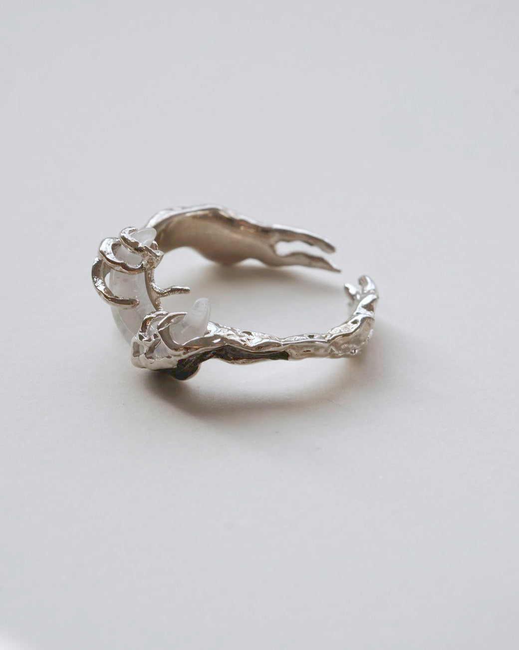 Dragon claw ring with an adjustable open band and a clear crystal centerpiece-side-view-SWEEKU jewelry