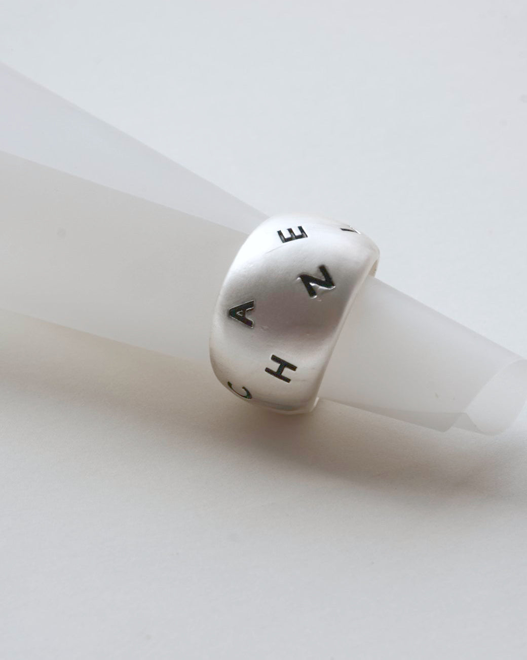 Engraved chunky copper band ring with a brushed finish and adjustable open band – detail view – SWEEKU jewelry