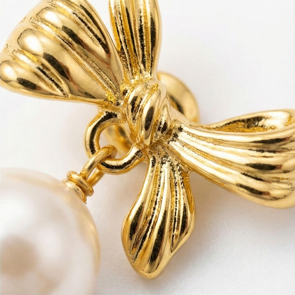 Golden Bow Pearl Drop Earrings