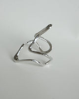 Irregular wavy statement bangle