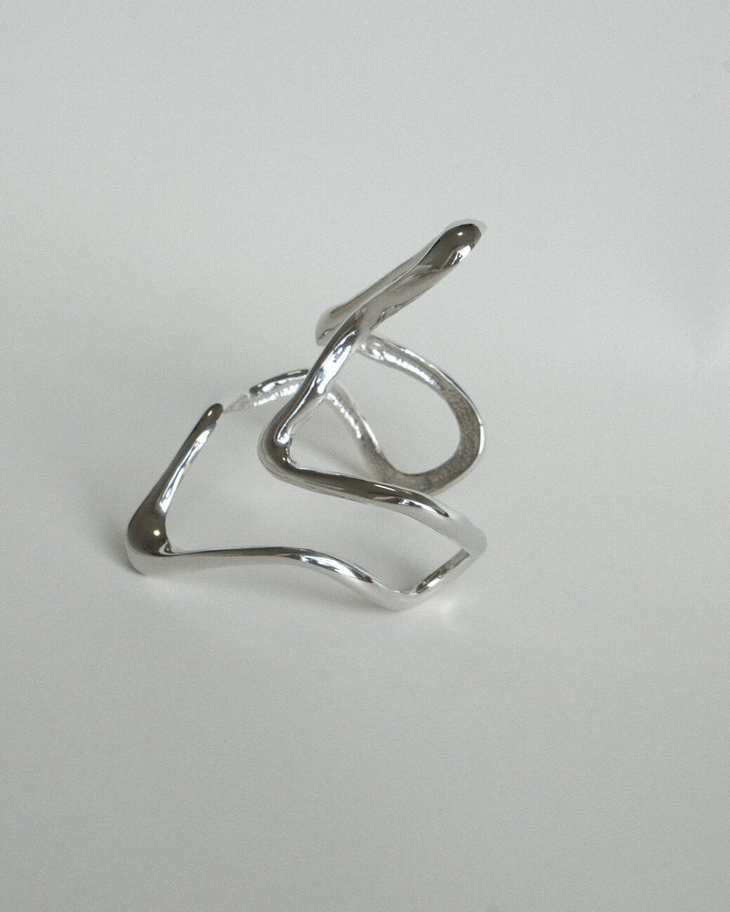 Irregular wavy statement bangle