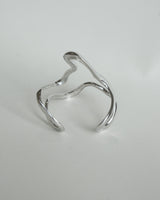 Irregular wavy statement bangle