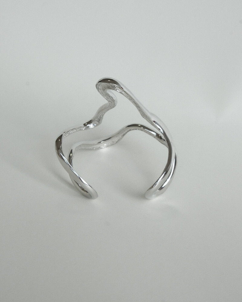 Irregular wavy statement bangle