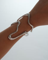 Irregular wavy statement bangle