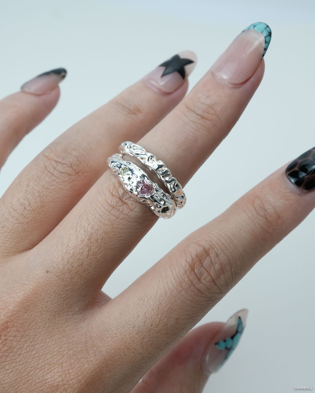 Aurora Bloom Ring worn on hand, organic silver texture with gemstones