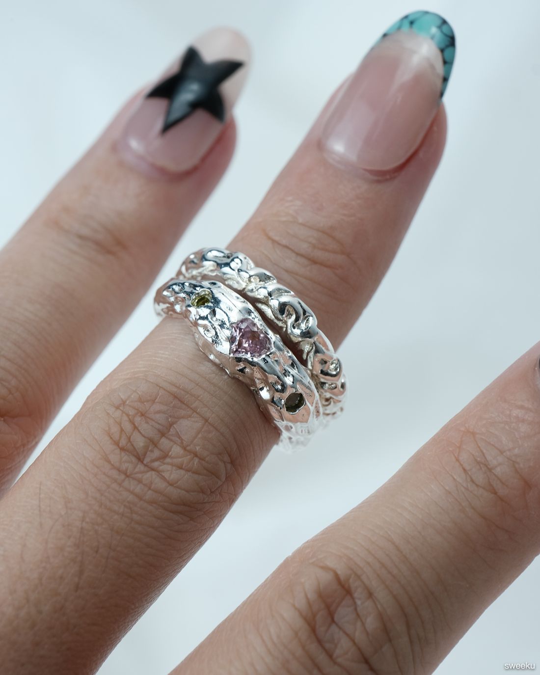 Aurora Bloom Ring worn on hand, organic silver texture with gemstones