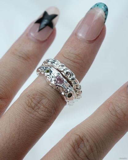 Aurora Bloom Ring worn on hand, organic silver texture with gemstones