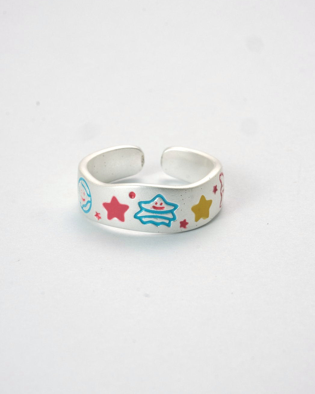 Adjustable silver enamel ring with colorful stars and cosmic motifs