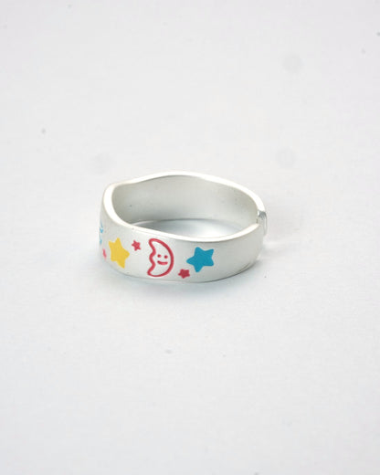 Adjustable silver enamel ring with colorful stars and cosmic motifs