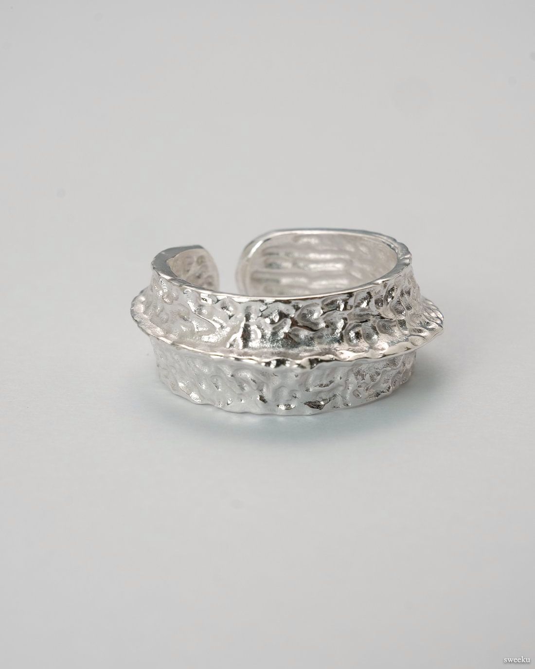 Crater Band Ring with hammered silver surface and adjustable band