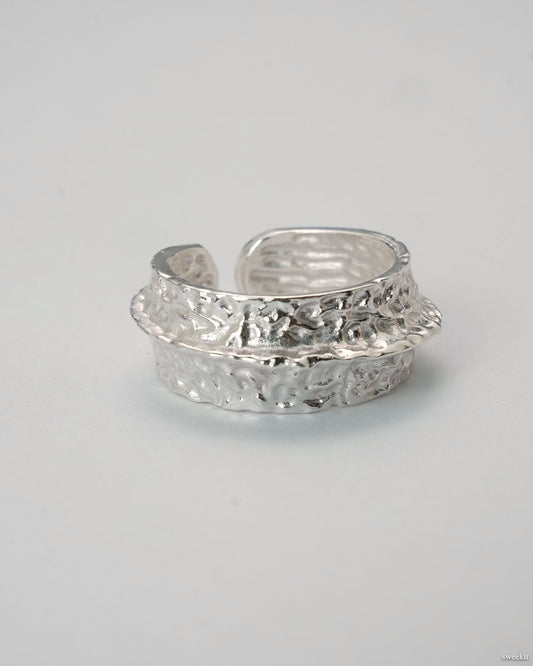 Crater Band Ring with hammered silver surface and adjustable band