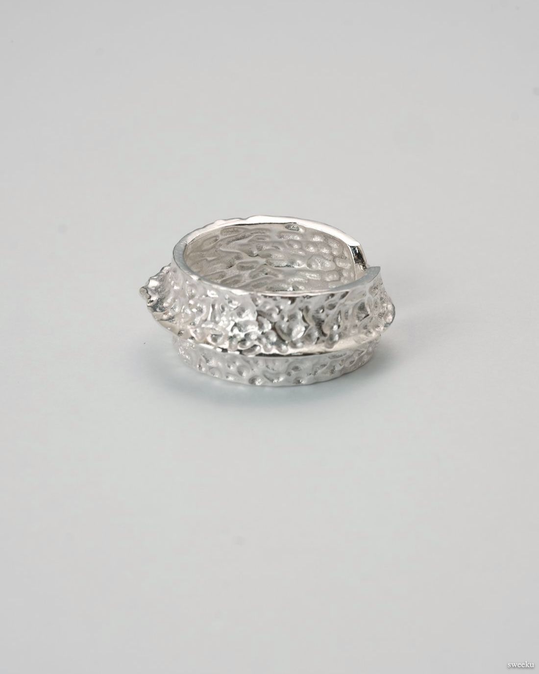Crater Band Ring with hammered silver surface and adjustable band