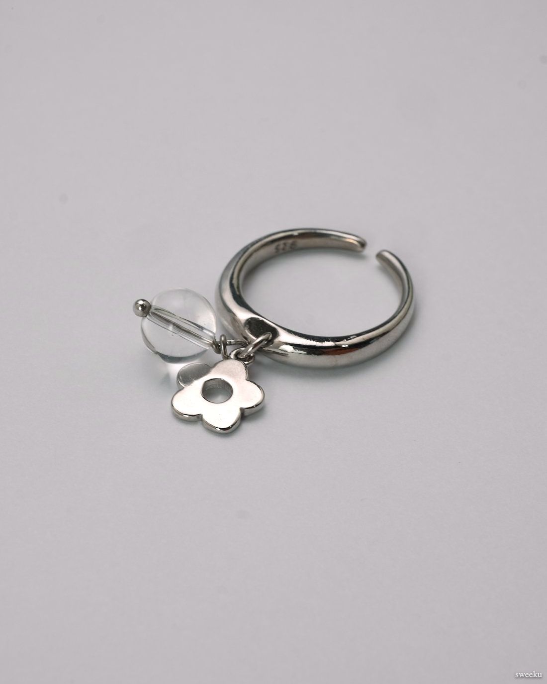 Dew Bloom Ring worn on hand, silver-plated adjustable ring with dangling charm and bead