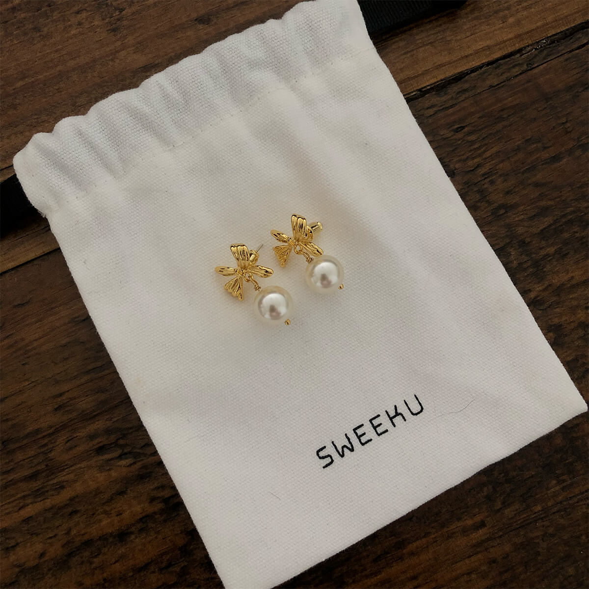 Golden Bow Pearl Drop Earrings
