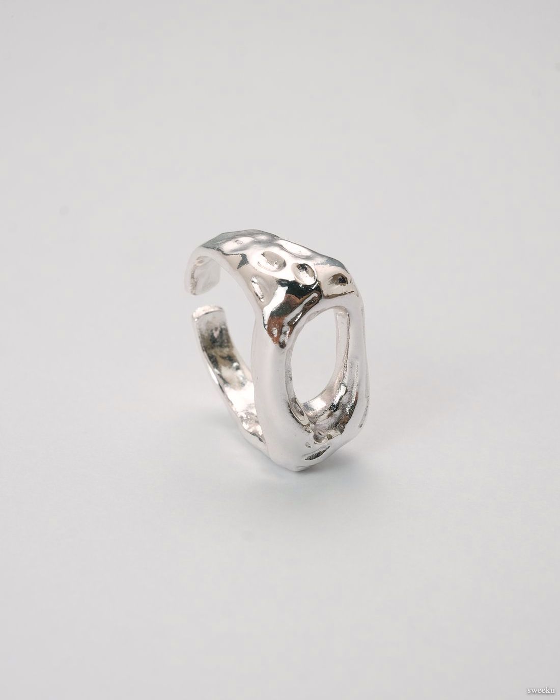 Echo Form Ring Set featuring silver sculptural and hammered adjustable rings