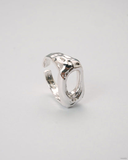 Echo Form Ring Set featuring silver sculptural and hammered adjustable rings