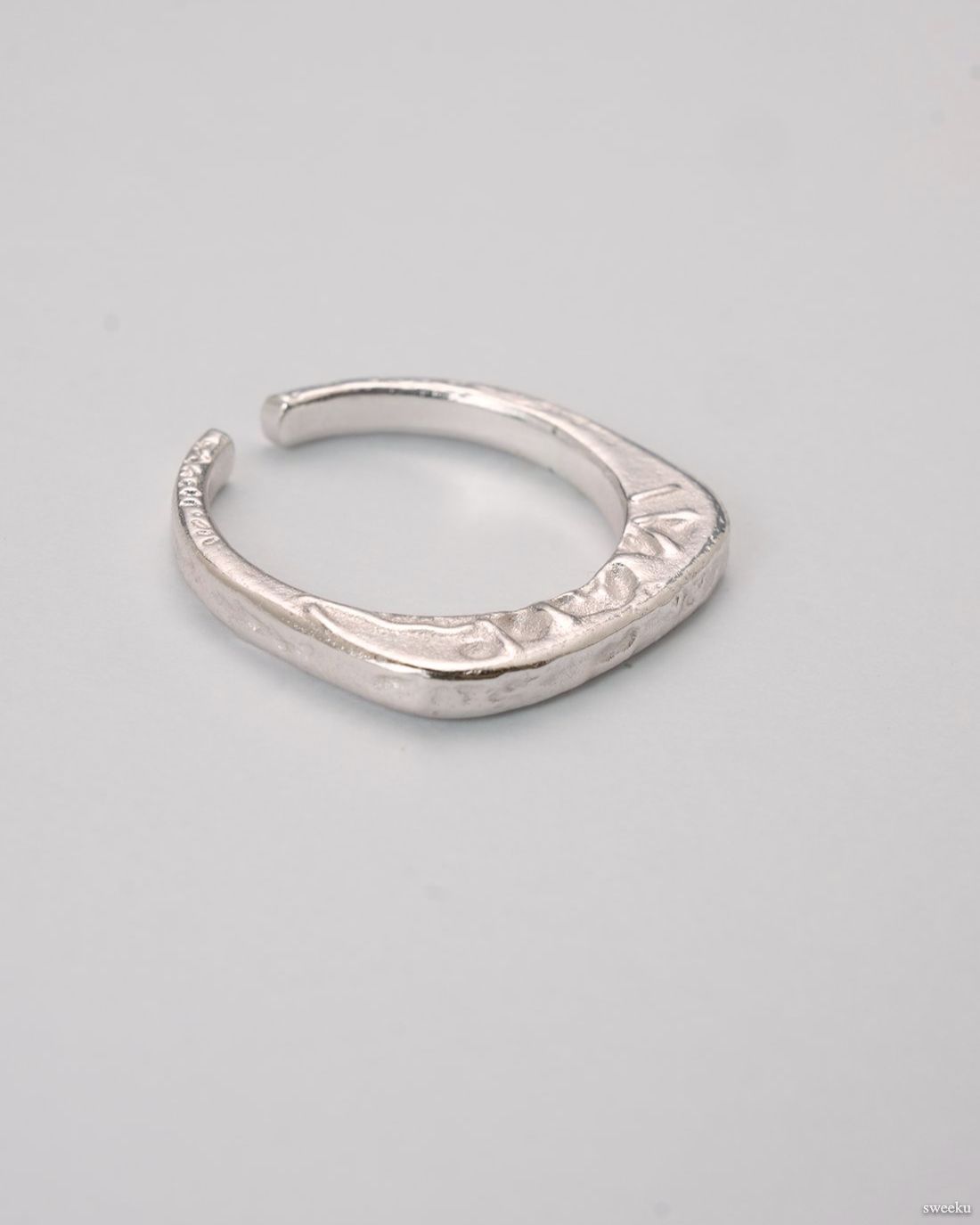 Echo Form Ring Set featuring silver sculptural and hammered adjustable rings