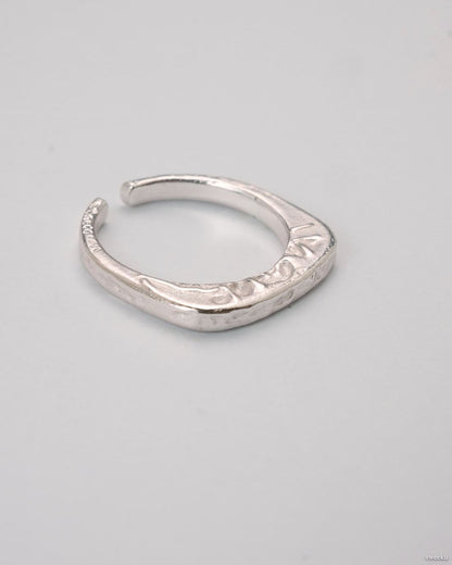 Echo Form Ring Set featuring silver sculptural and hammered adjustable rings