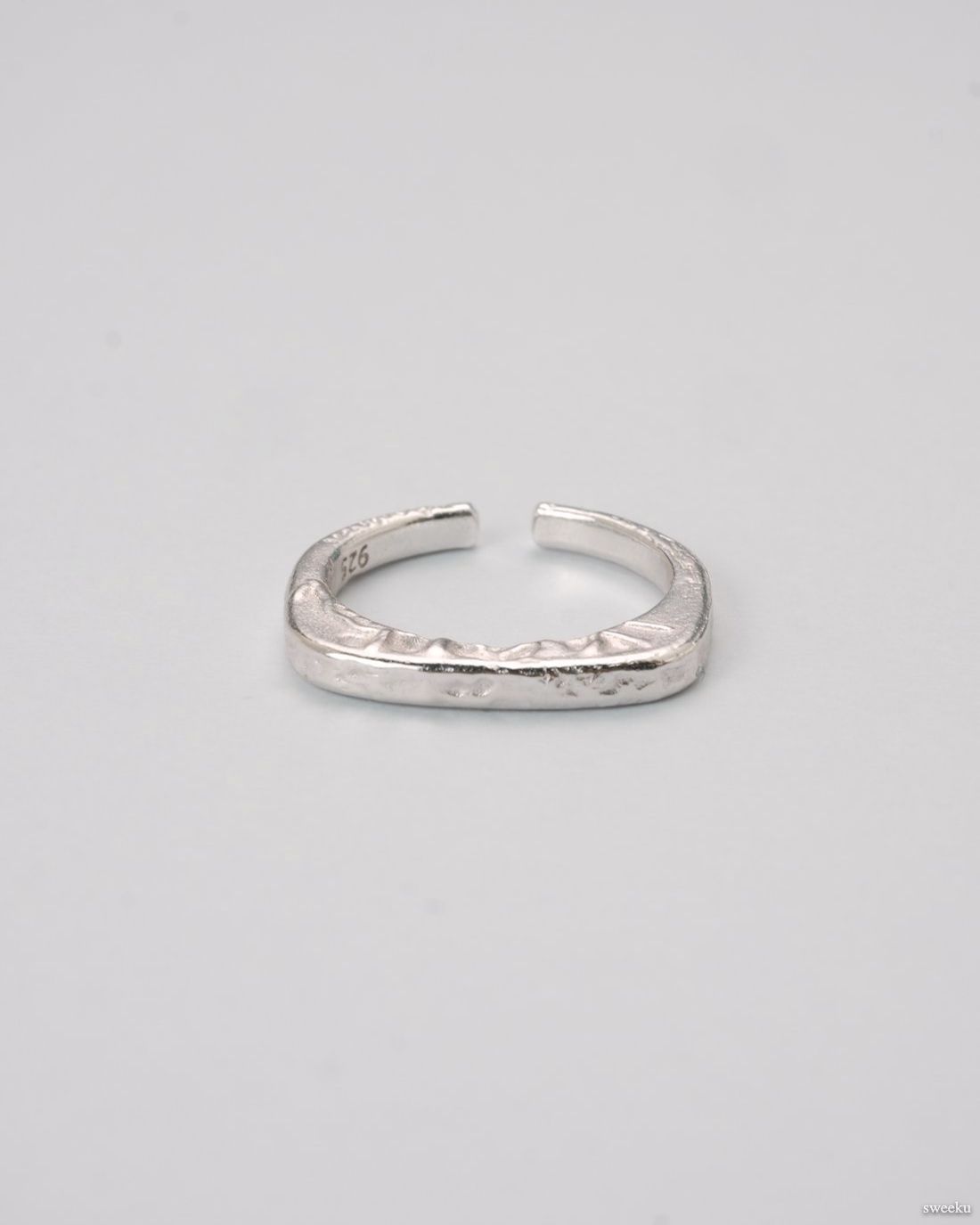 Echo Form Ring Set featuring silver sculptural and hammered adjustable rings