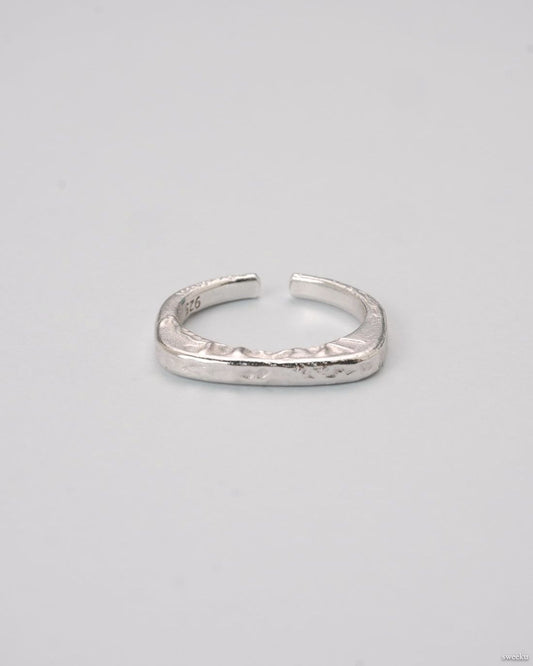 Echo Form Ring Set featuring silver sculptural and hammered adjustable rings