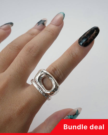 Echo Form Ring Set worn on hand showing open-form and textured silver bands
