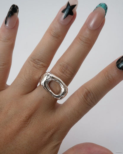 Echo Form Ring Set worn on hand showing open-form and textured silver bands