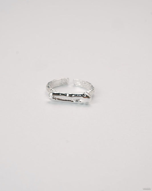 Molten Line Ring with organic silver ridge design and adjustable band.