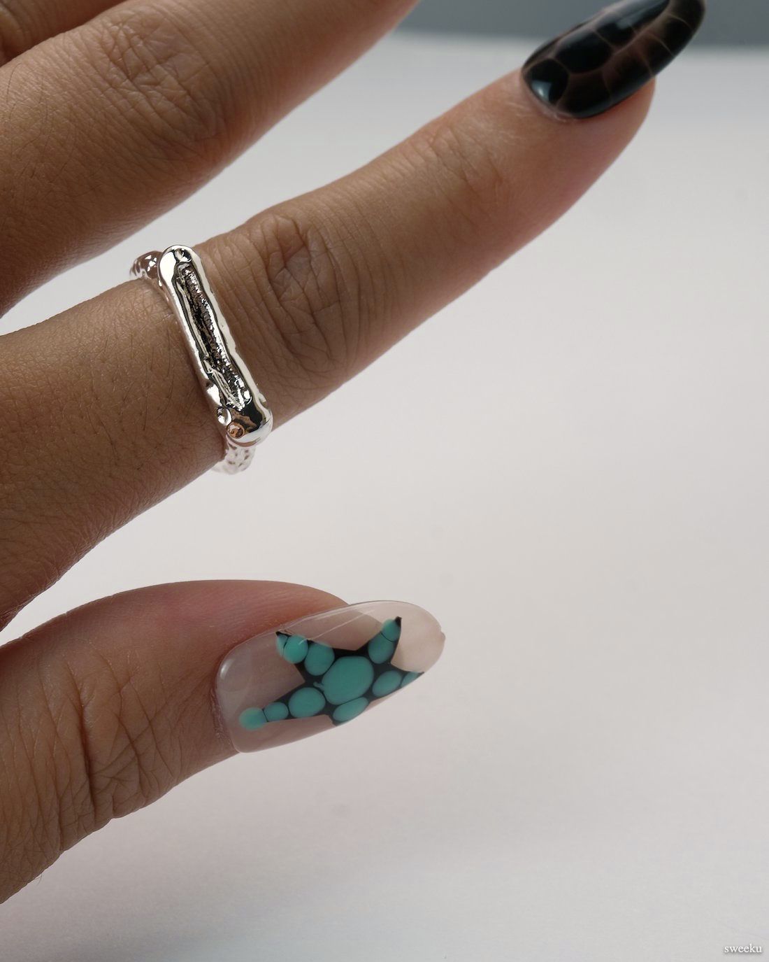 Molten Line Ring worn on hand, modern sculptural silver-plated ring