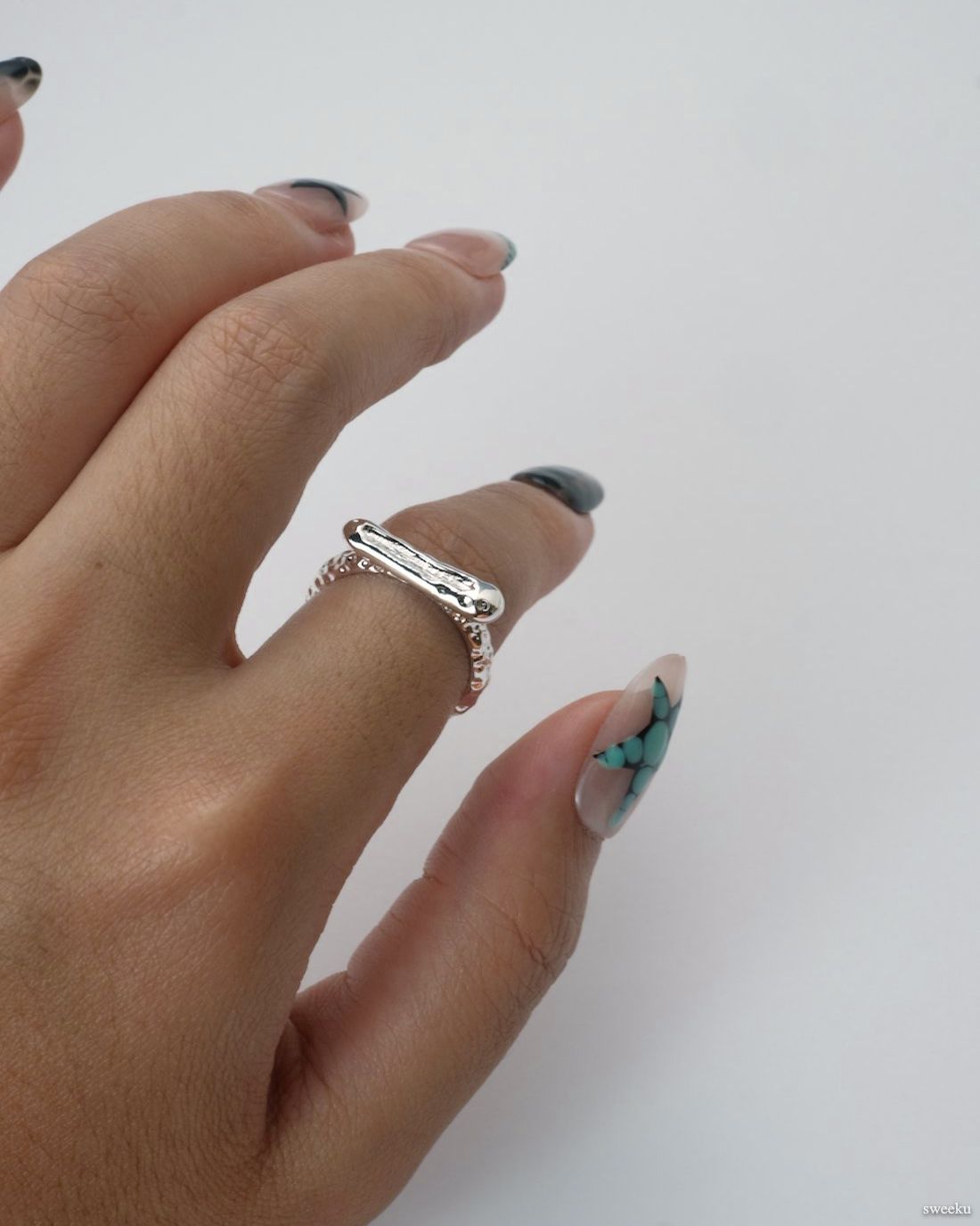 Molten Line Ring worn on hand, modern sculptural silver-plated ring