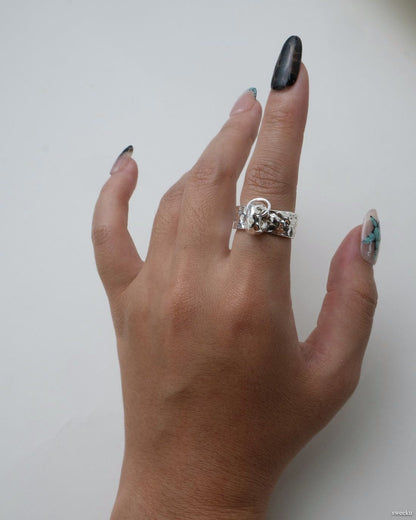 Silver plated molten loop ring worn on hand, adjustable open design