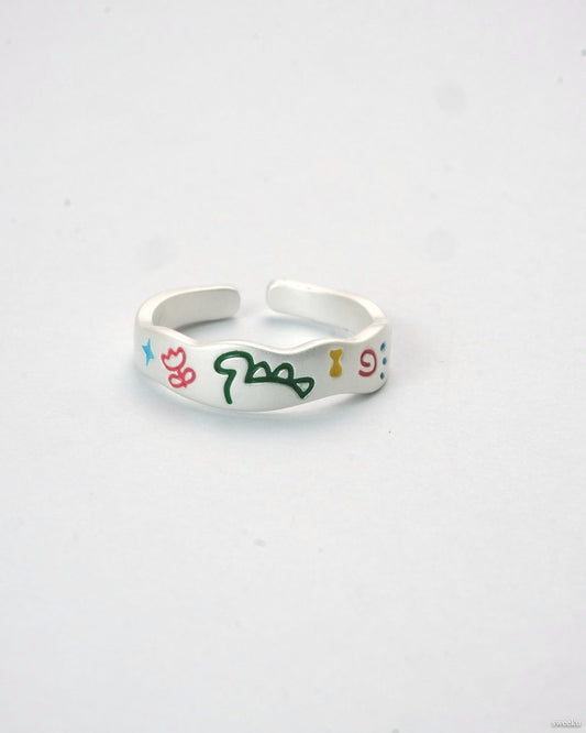 Adjustable silver enamel ring with colorful doodle design