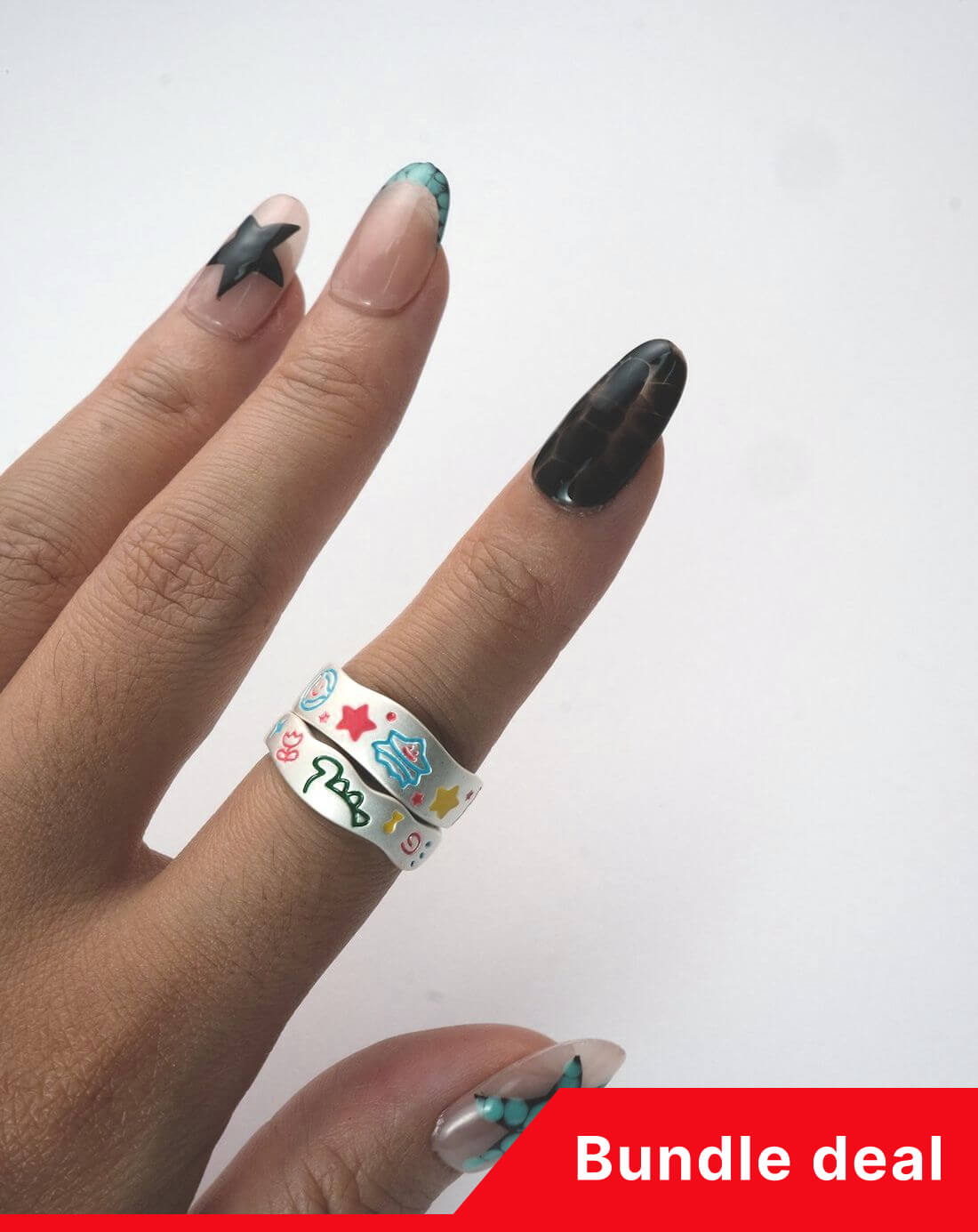 Neon Whirl Ring worn on hand, fun abstract enamel pattern on silver band