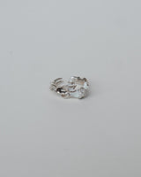 Dragon claw ring with an adjustable open band and a clear crystal centerpiece – front view – SWEEKU jewelry
