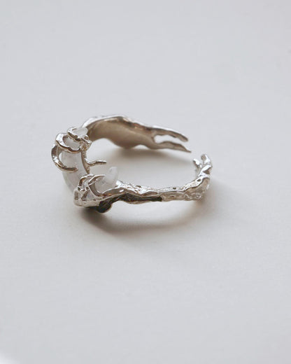 Dragon claw ring with an adjustable open band and a clear crystal centerpiece-side-view-SWEEKU jewelry