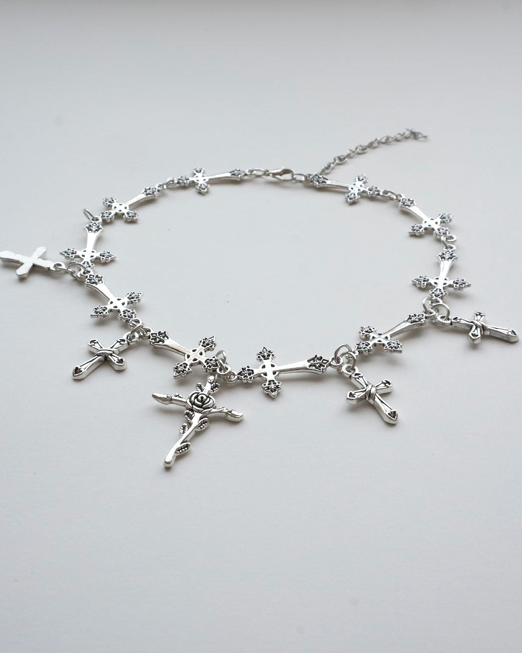 A gothic alloy chain necklace with various cross and rose charms - whole view - SWEEKU jewelry
