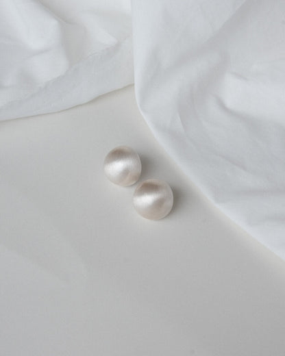 Pair of polished puffed dome copper stud earrings with 925 sterling silver posts - side view - SWEEKU jewelry