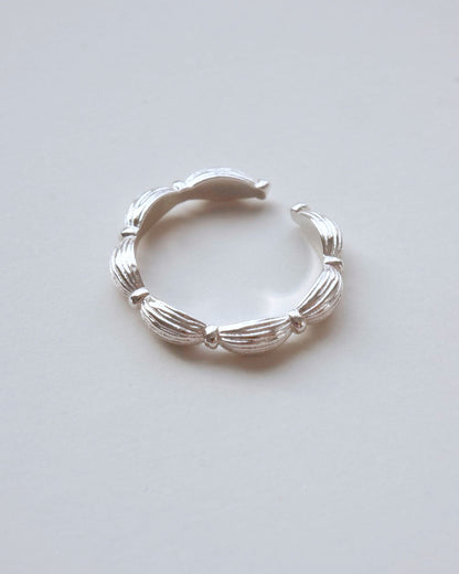 Ribbed copper adjustable ring with an open band and a small domed design – detail– SWEEKU jewelry