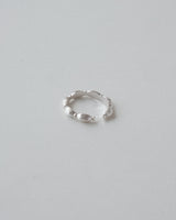 Sand-textured chunky adjustable ring with a sculptural, fluid design – front view – SWEEKU jewelry
