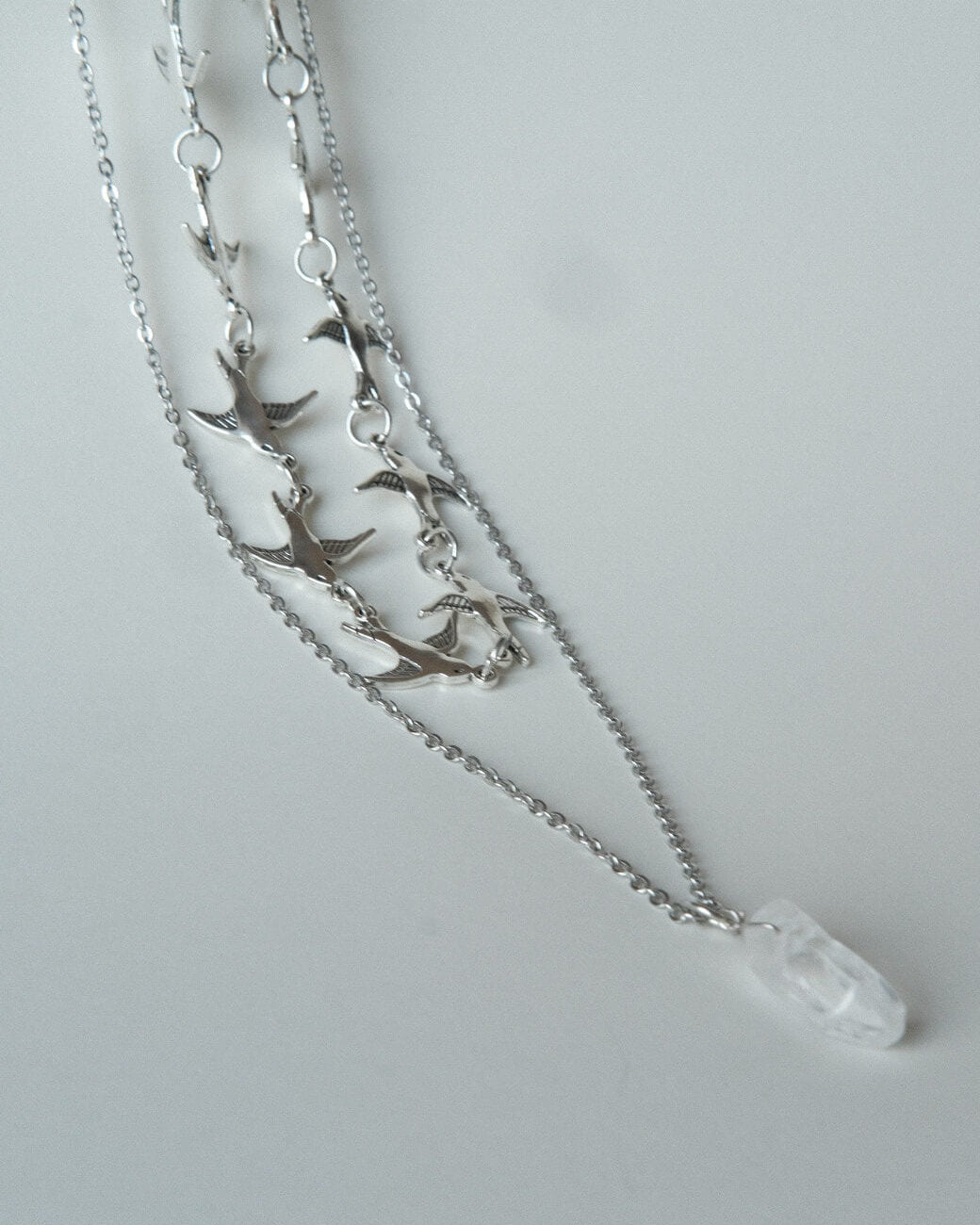 Layered necklace set with a bird chain link choker and a separate crystal pendant necklace - front view - 2 - SWEEKU jewelry