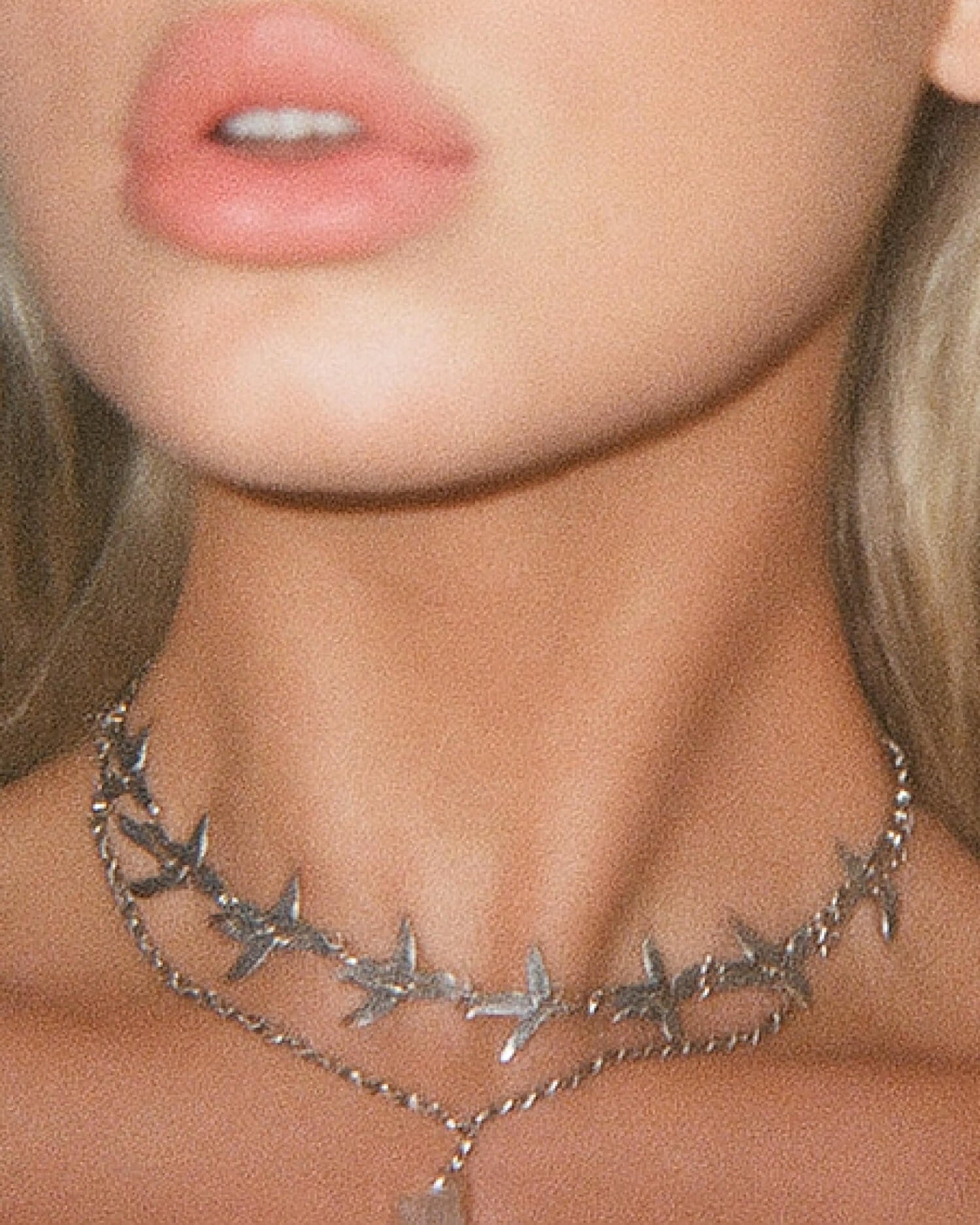 Model wearing layered necklace set with a bird chain link choker and a separate crystal pendant necklace – front view – SWEEKU jewelry