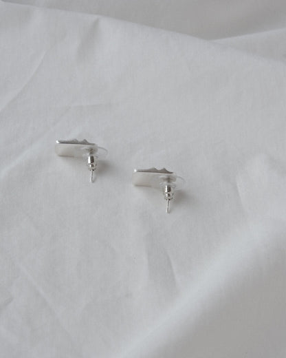 Pair of wavy rectangle copper stud earrings with silver posts and a textured, modern design - back view - SWEEKU jewelry