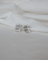Pair of wavy rectangle copper stud earrings with silver posts and a textured, modern design - front view - SWEEKU jewelry