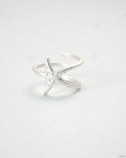 Tidal Star Ring with silver starfish design and adjustable band