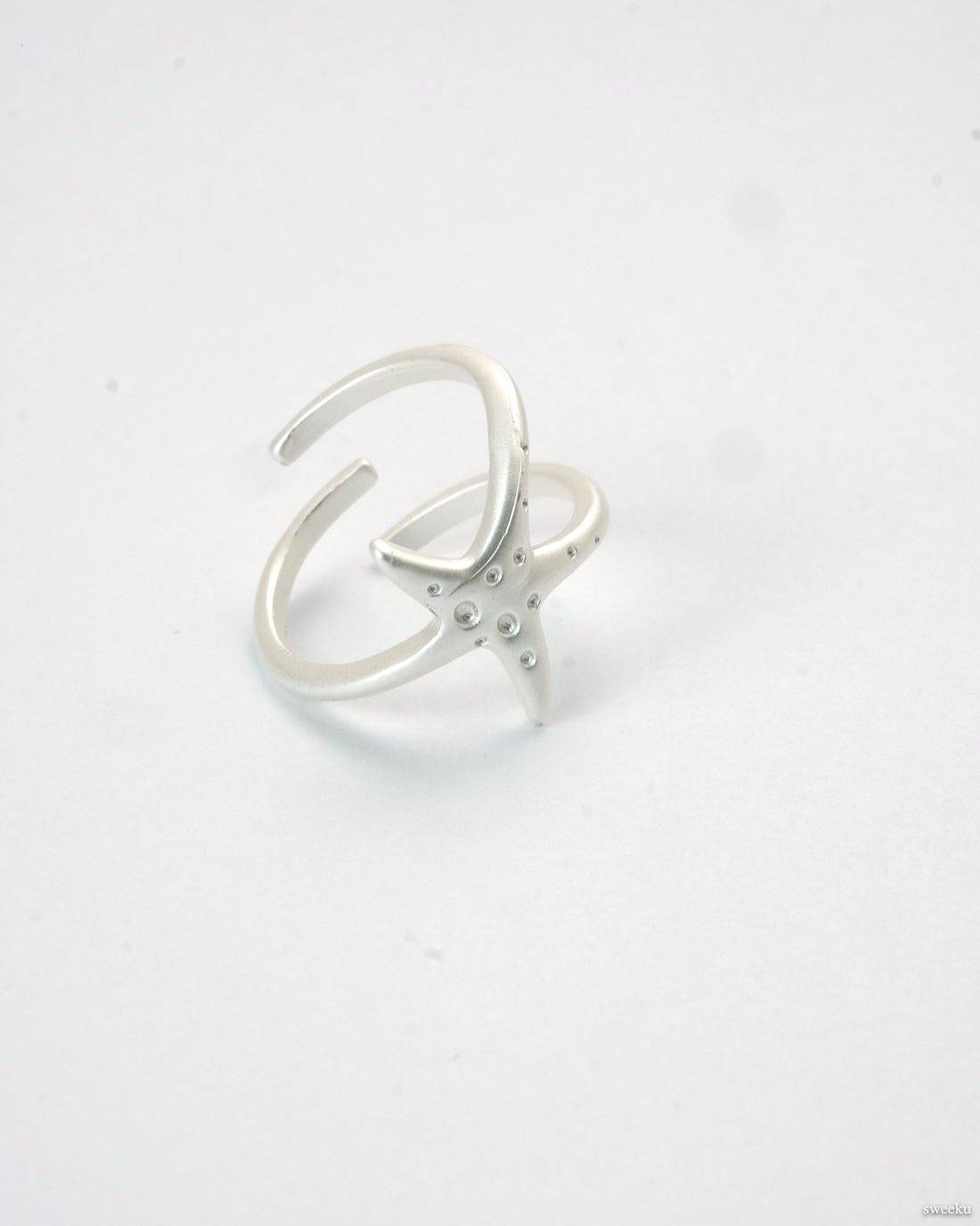 Tidal Star Ring with silver starfish design and adjustable band