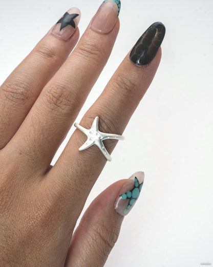 Tidal Star Ring worn on hand, silver-plated ocean-inspired ring