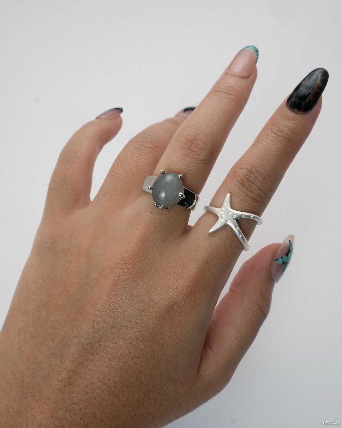 Tidal Star Ring worn on hand, silver-plated ocean-inspired ring